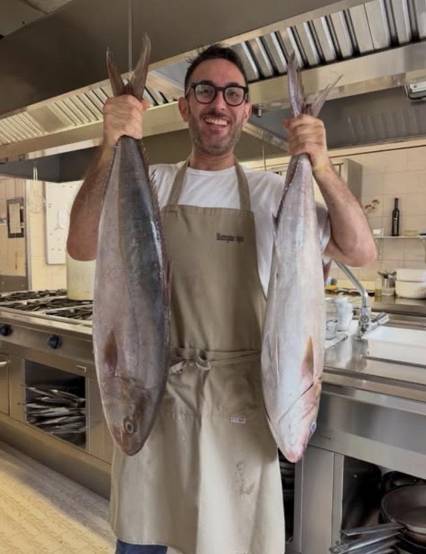 The day’s amberjack — the apron reads 1901