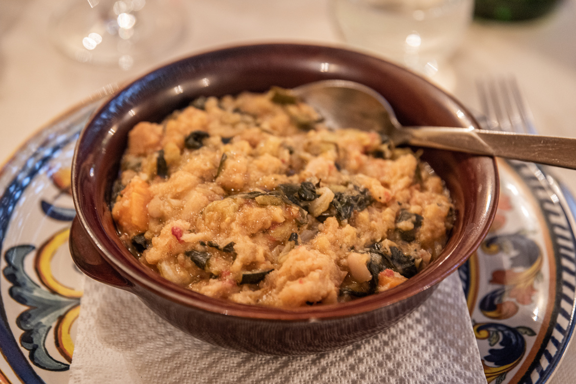 Hearty Tuscan soup served in a ceramic bowl