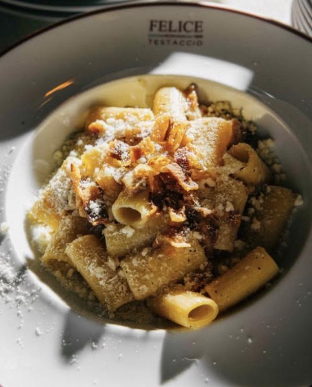 Rigatoni in the house bowl, pecorino grated at the table
