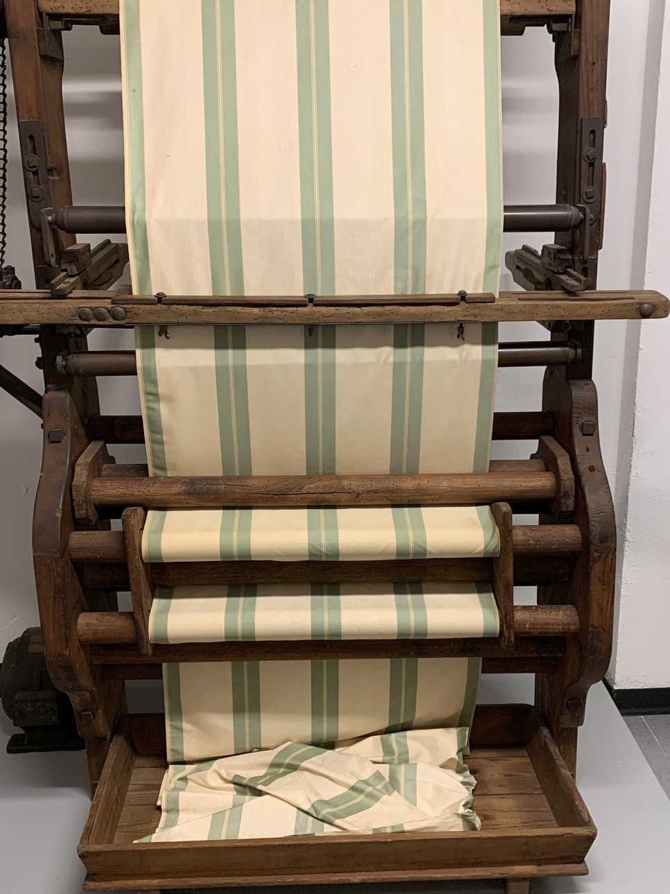 Warped striped silk on a loom frame