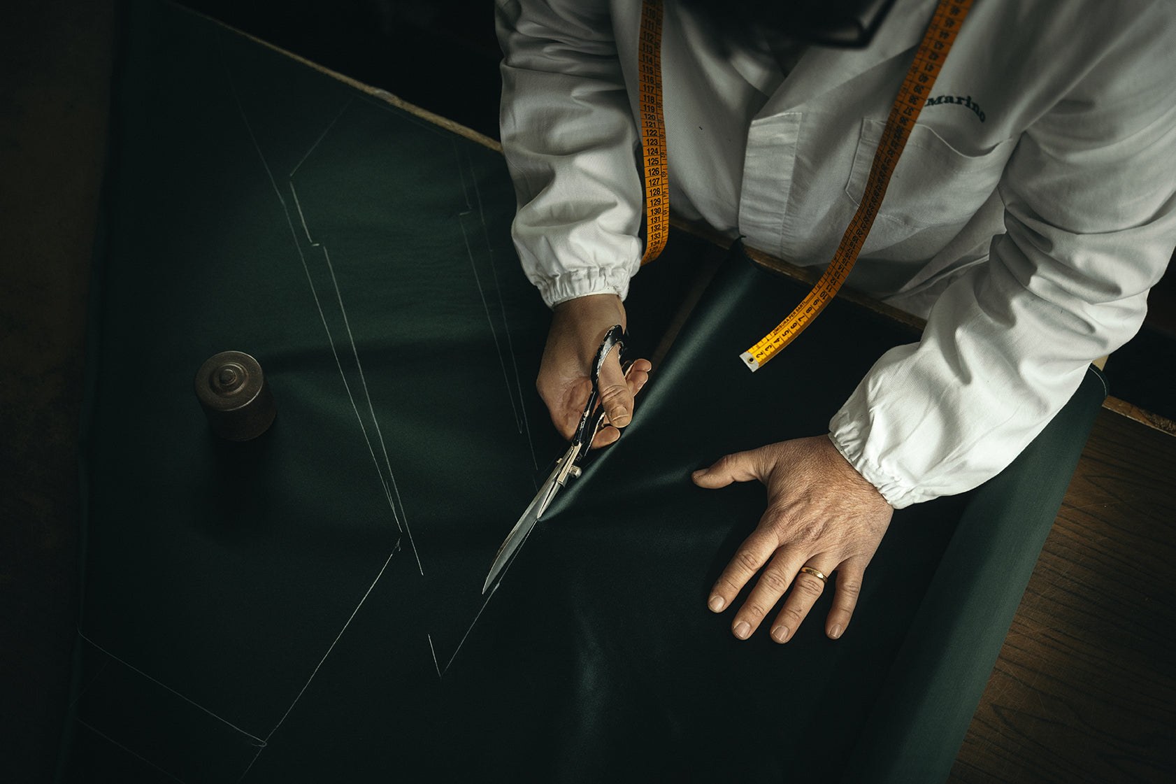 Cutting silk by hand at F. Marino, Naples