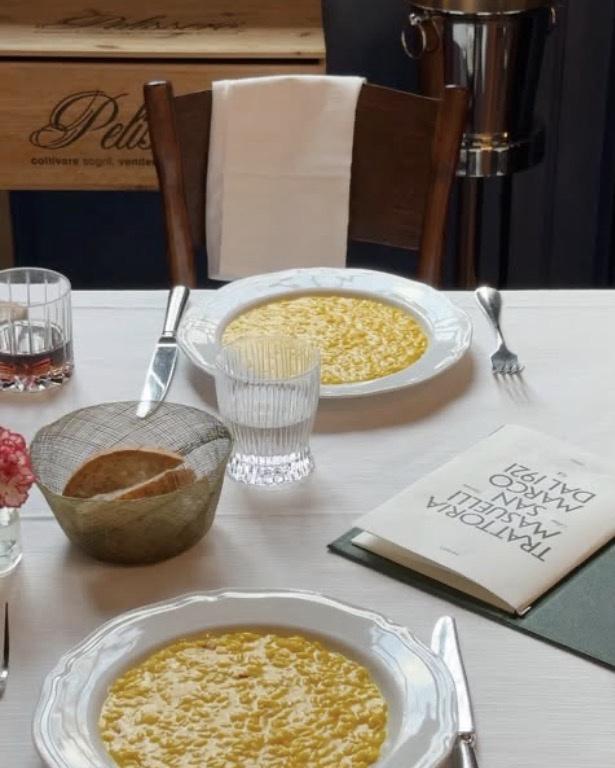 Risotto alla milanese, the house menu still carrying the founding year