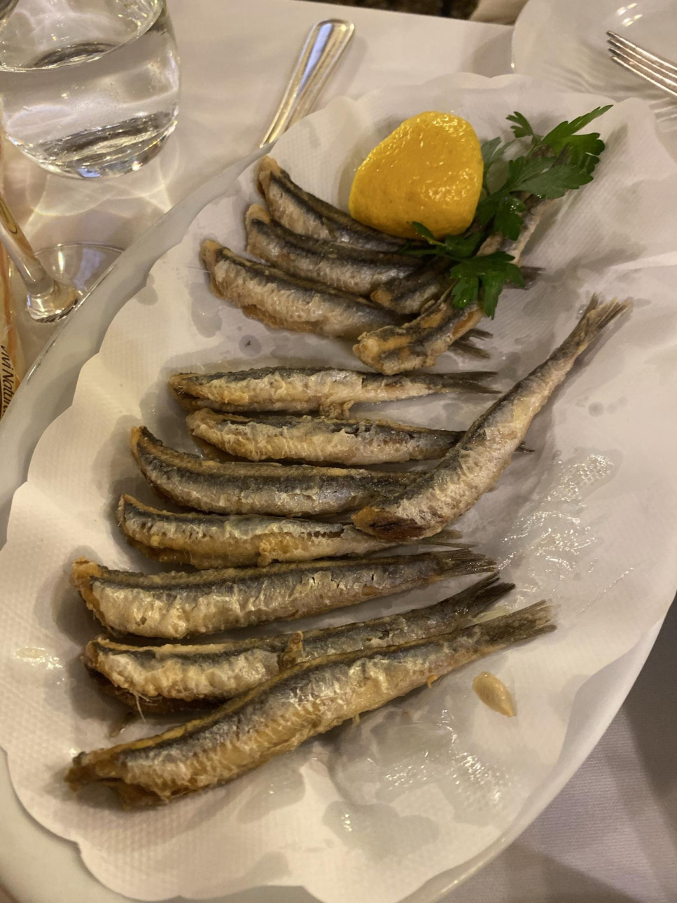 Fried smelts, lemon, parsley